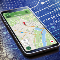 A compass sits next to a smartphone with a GPS app pointing to a location on a map.