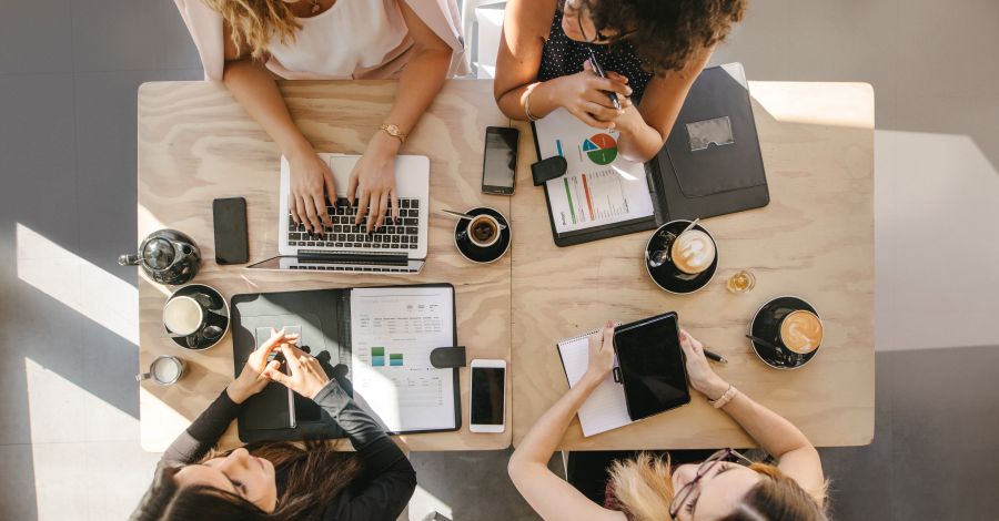 A group of people working at a table