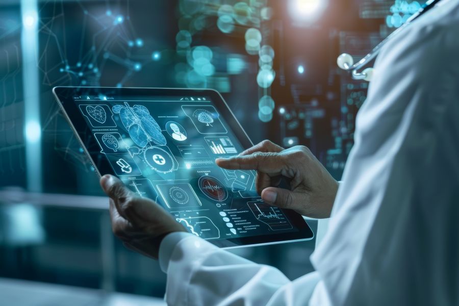 Physician viewing patient data on a tablet.