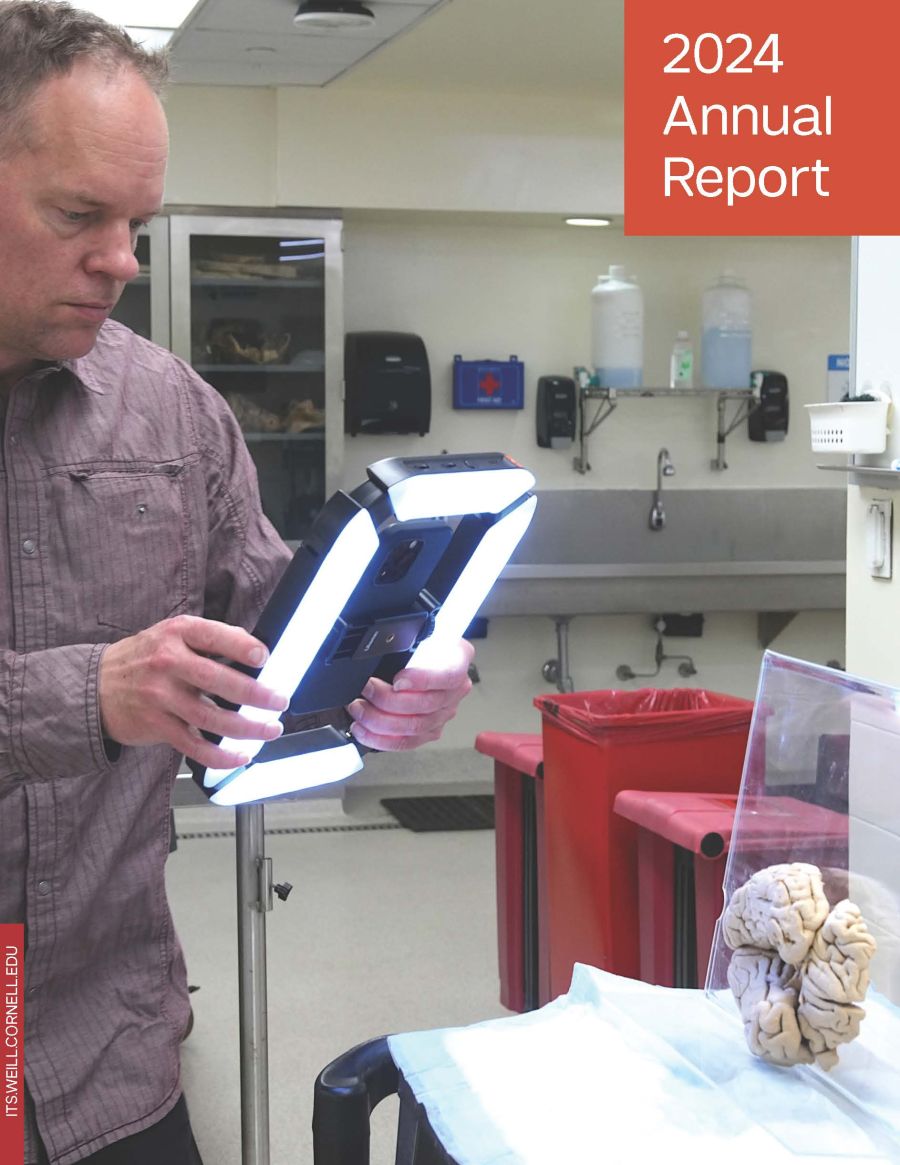 FY2024 Annual Report cover featuring Instructional Technologies Manager Rob Dietz taking images of a brain from the Anatomy lab to compile a 3D image.