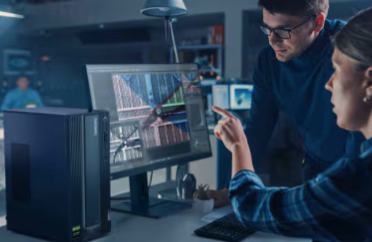 people working on a Lenovo