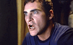 GIF of Joaquin Phoenix from Signs screaming in horror