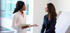 Physician speaking with a patient