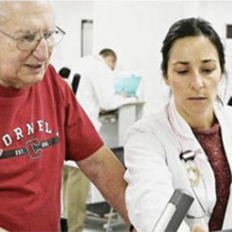 A physician helping a patient who is part of a clinical trial